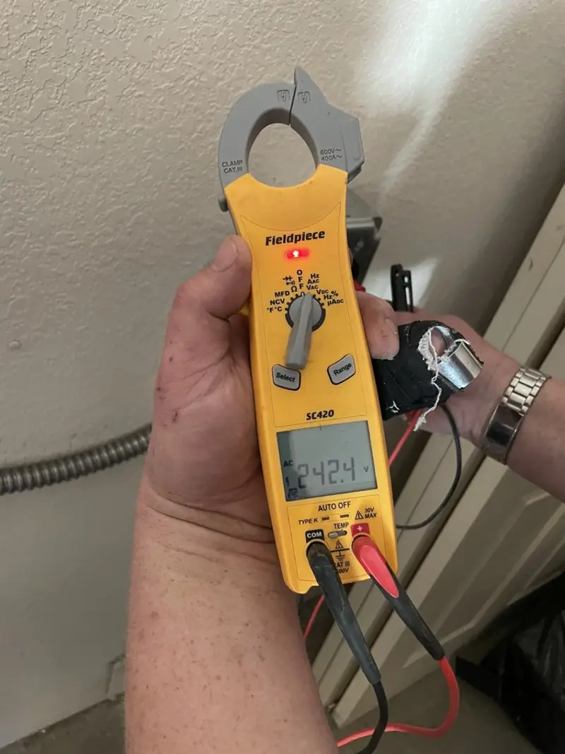 Voltage testing with clamp meter during Aluminum Wiring Replacement in Nottingham